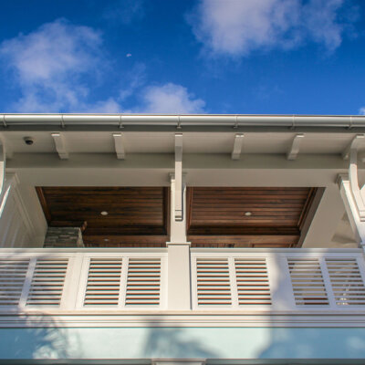 Home design Soffit system comprised of rafter tails, fascia board, and pvc brackets made by hardie boys inc.