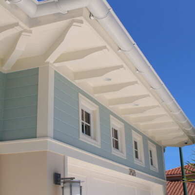 Home design Soffit system comprised of rafter tails, fascia board, and pvc brackets made by hardie boys inc.