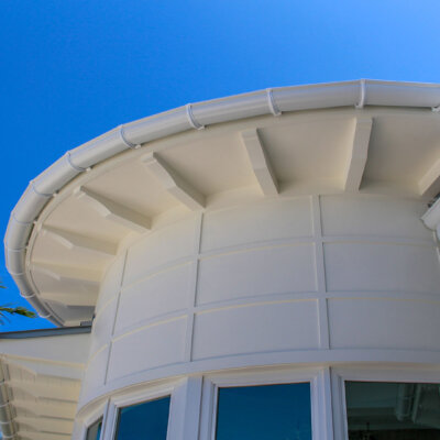 Home design Soffit system comprised of rafter tails, fascia board, and pvc brackets made by hardie boys inc.