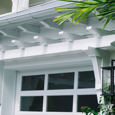 pergola above windows on a florida home