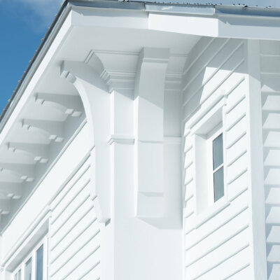 Home design Soffit system comprised of rafter tails, fascia board, and pvc brackets made by hardie boys inc.