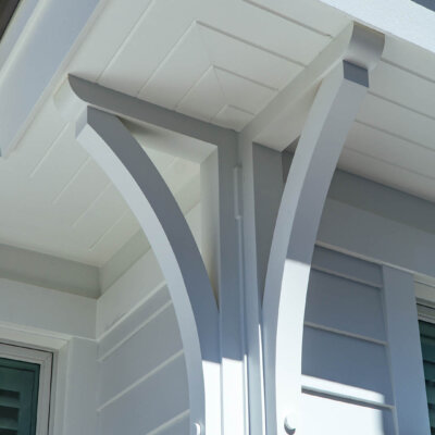 Home design Soffit system comprised of rafter tails, fascia board, and pvc brackets made by hardie boys inc.