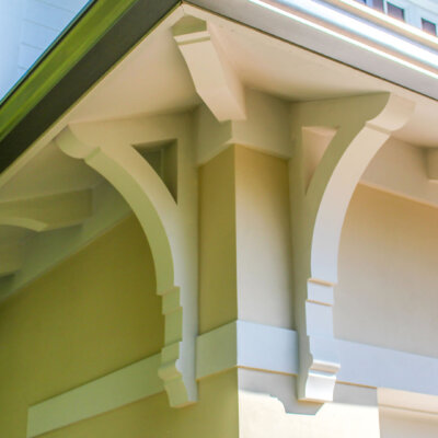 Soffit system comprised of rafter tails, fascia board, and pvc brackets made by hardie boys inc