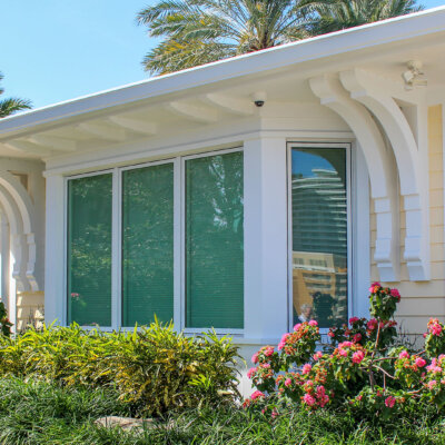 Soffit system comprised of rafter tails, fascia board, and pvc brackets made by hardie boys inc