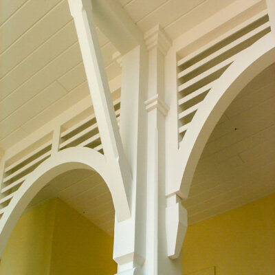 Soffit system comprised of rafter tails, fascia board, and pvc brackets made by hardie boys inc
