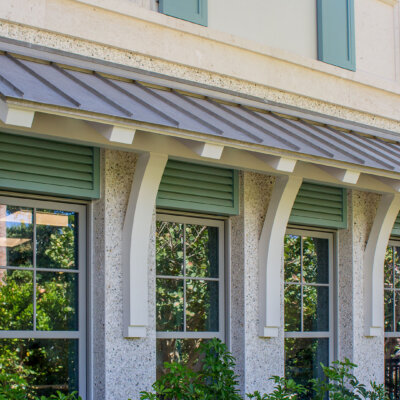 pergola above windows on a florida home