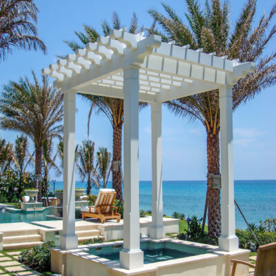 pergola above pool on a coastal home
