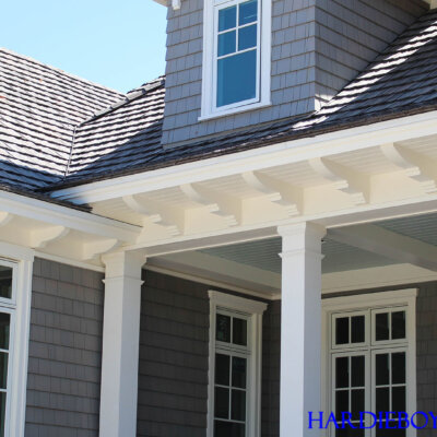 Home design Soffit system comprised of rafter tails, fascia board, and pvc brackets made by hardie boys inc.