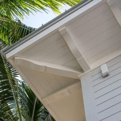 Home design Soffit system comprised of rafter tails, fascia board, and pvc brackets made by hardie boys inc.