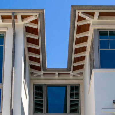 Home design Soffit system comprised of rafter tails, fascia board, and pvc brackets made by hardie boys inc.