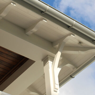 Home design Soffit system comprised of rafter tails, fascia board, and pvc brackets made by hardie boys inc.