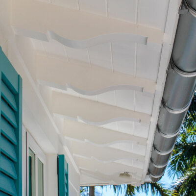 Home design Soffit system comprised of rafter tails, fascia board, and pvc brackets made by hardie boys inc.
