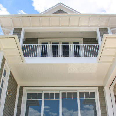 Home design Soffit system comprised of rafter tails, fascia board, and pvc brackets made by hardie boys inc.