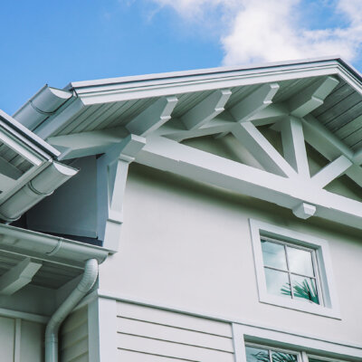 Home design Soffit system comprised of rafter tails, fascia board, and pvc brackets made by hardie boys inc.
