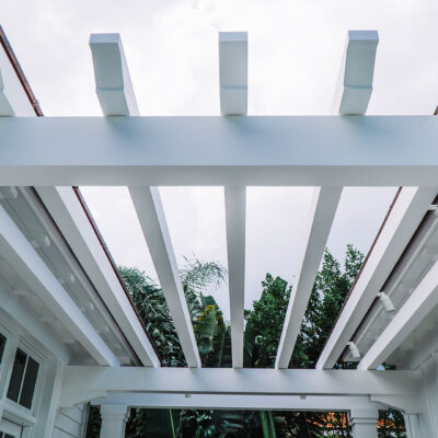 PVC Trellis on florida home by hardie boys