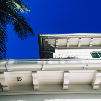 Home design Soffit system comprised of rafter tails, fascia board, and pvc brackets made by hardie boys inc.