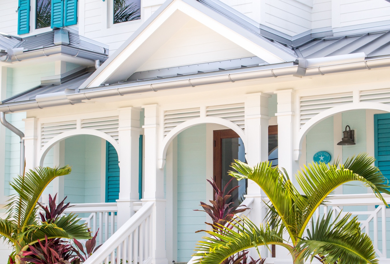 exterior pvc trim comprised of louvers and columns.