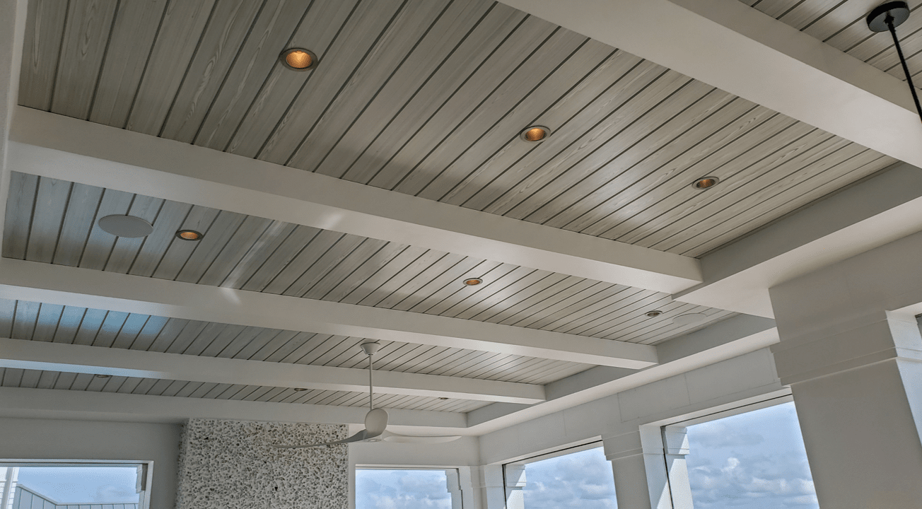 tongue and groove soffit ceiling with beautiful wood staining.
